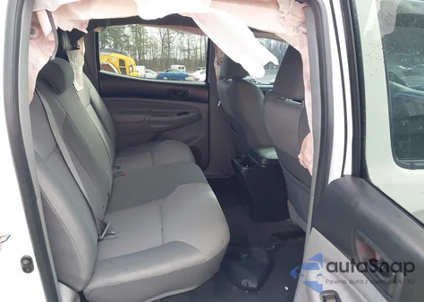 2015 Toyota Tacoma Base V6 z USA, uszkodzony, nr VIN 3TMLU4ENXFM207224